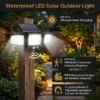 3‑head solar motion sensor outdoor light mounted on garden wooden fence post