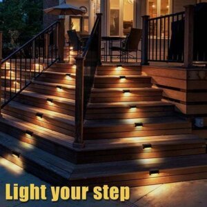 Solar Step Lights Outdoor - Waterproof Multi-Pack 4 Outdoor solar step lights installed on wooden deck stairs, warm white illumination for patio and garden safety lighting