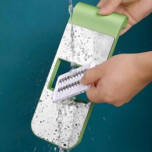 Easy to clean mandoline slicer with detachable blades, rinse under running water for quick cleanup 