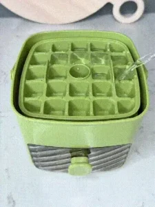 2-in-1 ice cube maker and storage bin, filling water into silicone tray