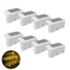 Clean white solar step lights set, blending well with light-colored decks and fences. 8-pack white solar step lights set, showing LED night light effect
