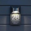 Personalised custom LED house number plaque, modern black outdoor illuminated door address sign, bespoke house name plate for UK home exterio