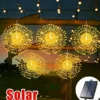 olar Firework Lights Hanging on Beams Warm white solar firework string lights hanging on outdoor wooden beams