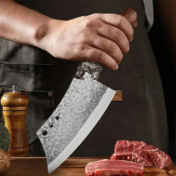 hand forged wolf head bone cleaver cutting raw beef meat wooden handle