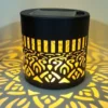 Colour changing solar mandala projector light, black cylindrical solar powered mandala pattern outdoor LED projection wall light