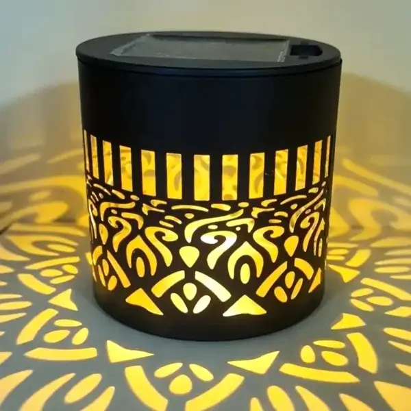 Colour changing solar mandala projector light, black cylindrical solar powered mandala pattern outdoor LED projection wall light