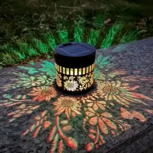 Colour changing solar mandala projector light, beautiful floral mandala projection on patio ground