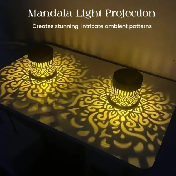 Colour changing solar mandala projector light, two solar mandala LED projection lights casting beautiful mandala patterns on table